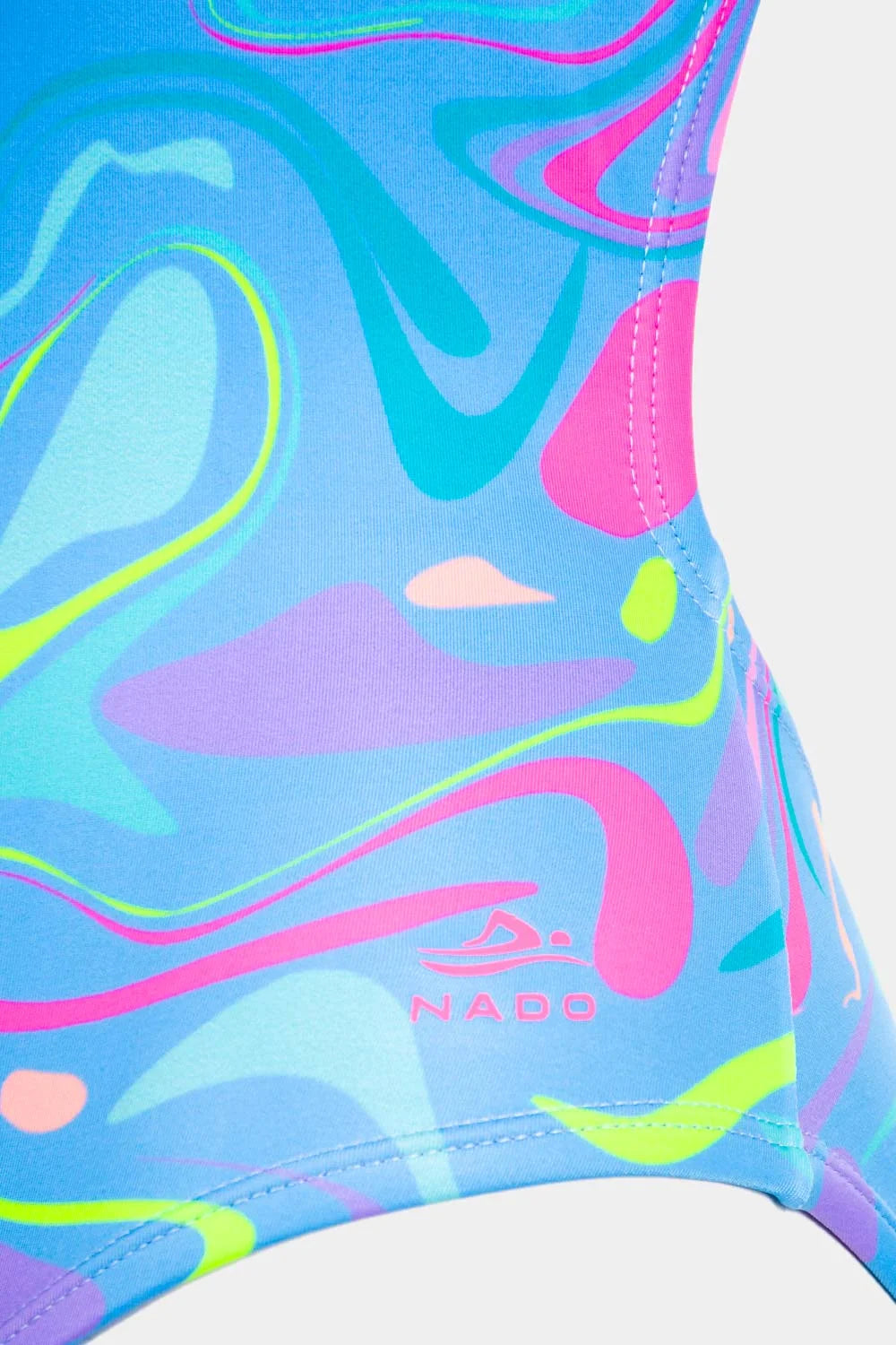 Women's neon print one-piece swimsuit in blue purple swirl, fabric detail close-up – Bikini Uni