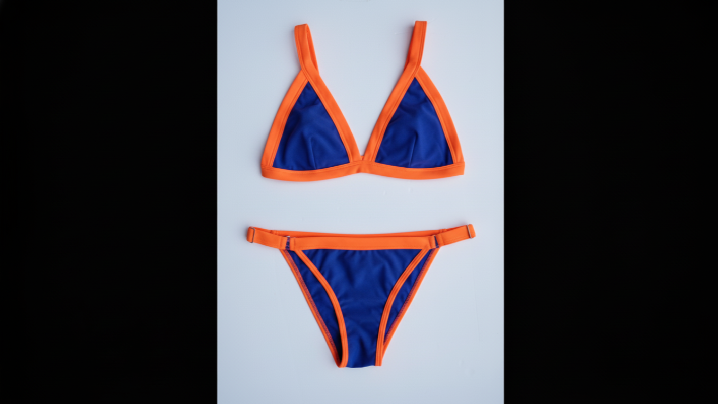 Ameri-Cali bikini in blue with orange trim, front flatlay view – Bikini Uni
