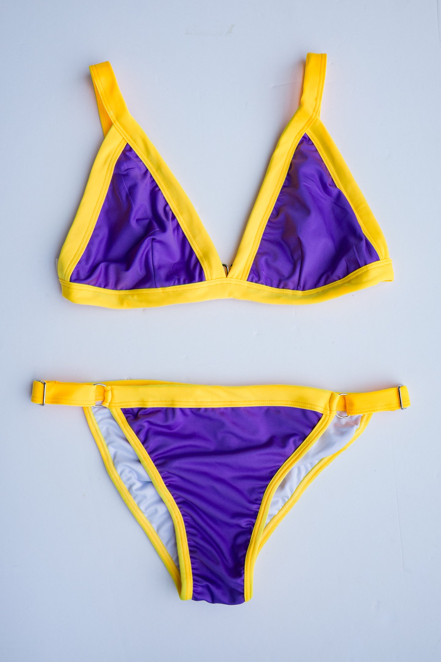 Ameri-Cali bikini in purple with gold, flatlay view – Bikini Uni