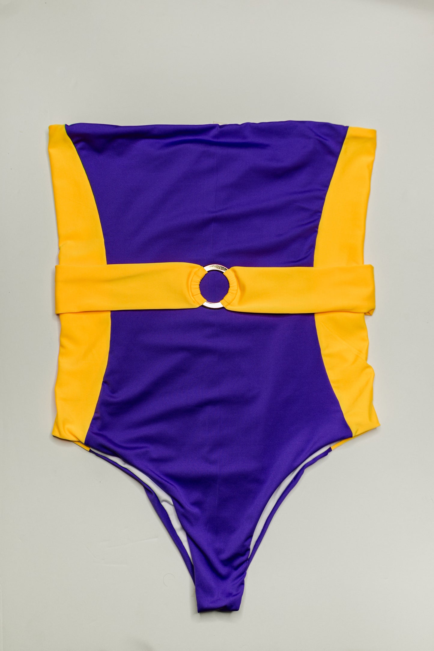 Bella Cintura two-piece bikini in purple with gold, front flatlay view – Bikini Uni