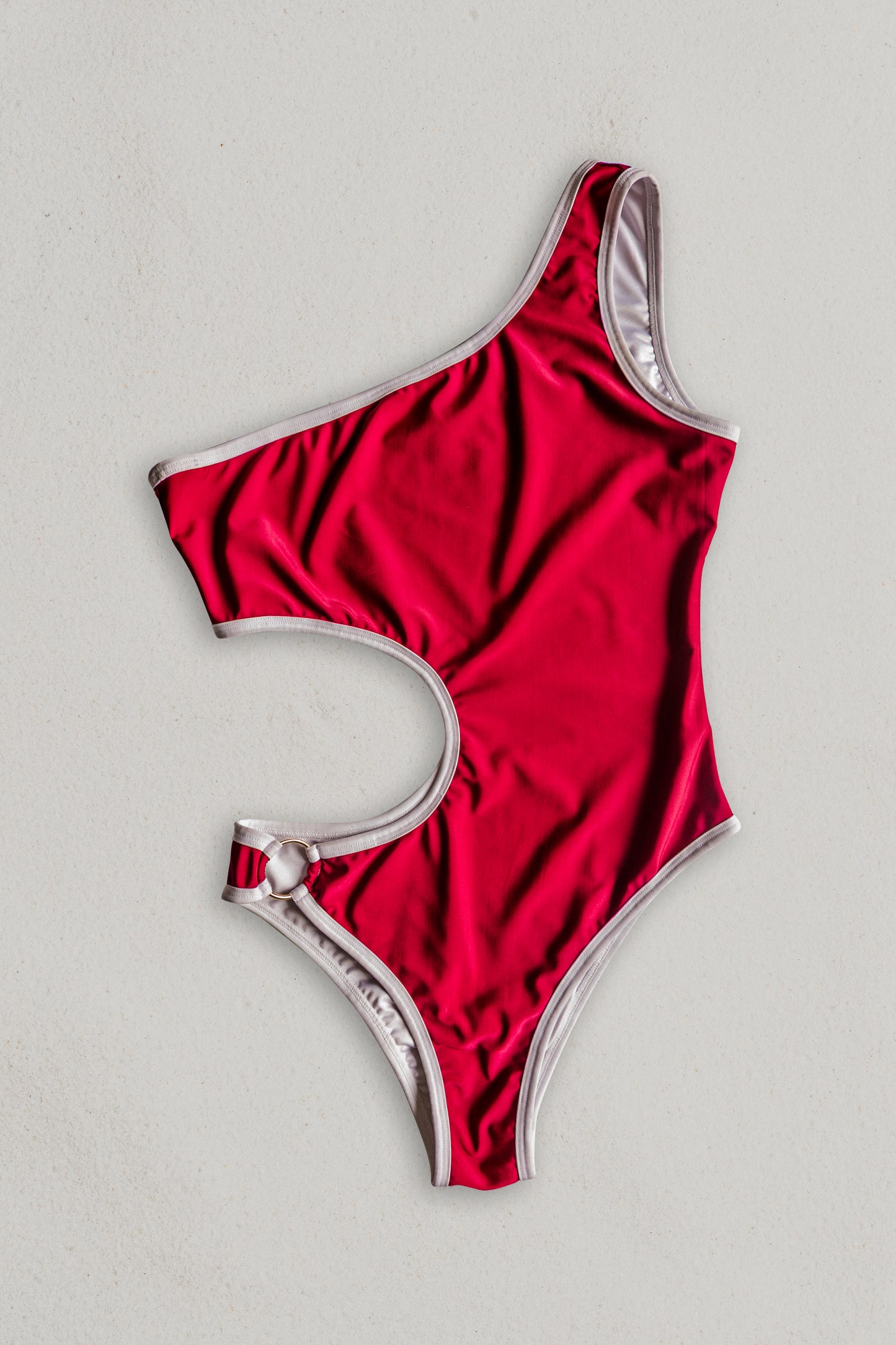 Boomerang one-piece swimsuit in red with white, front view – Bikini Uni