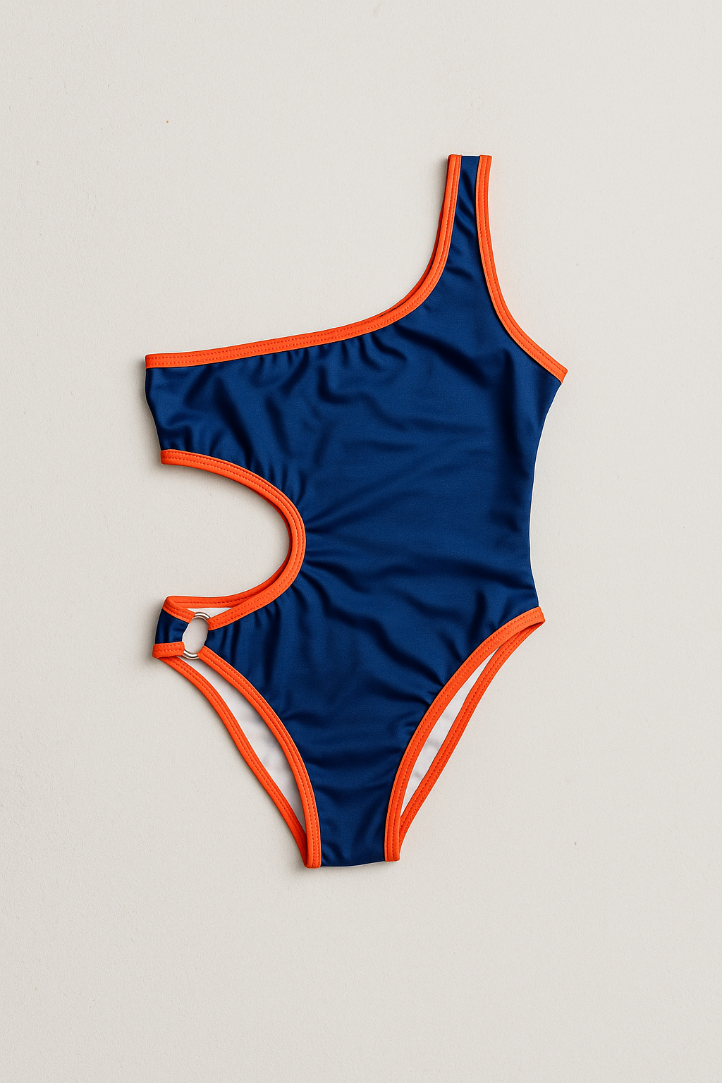 Boomerang one-piece swimsuit in royal blue with orange, front view – Bikini Uni
