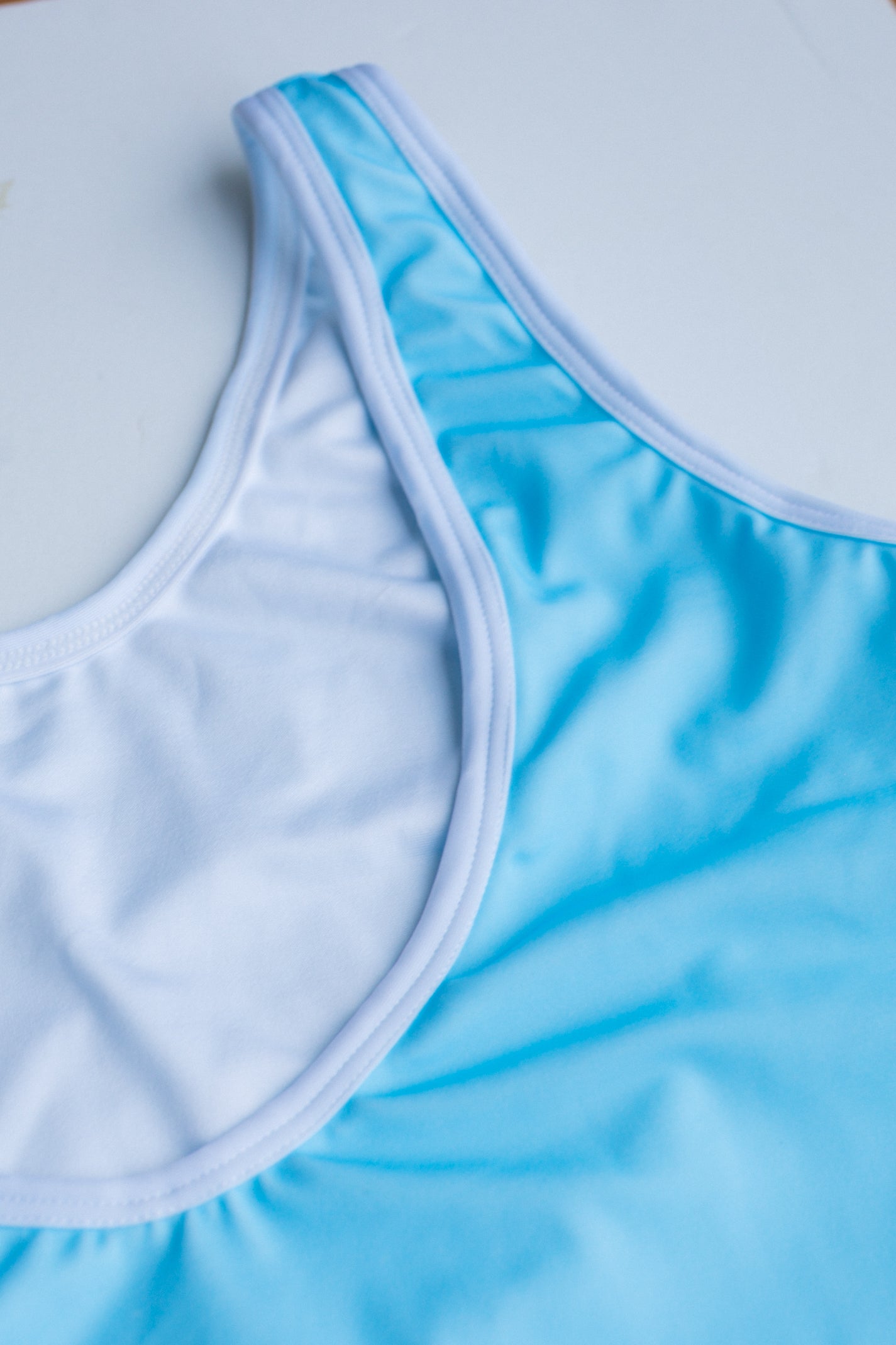 La Tradicional bikini in light blue with white trim, top close-up view – Bikini Uni