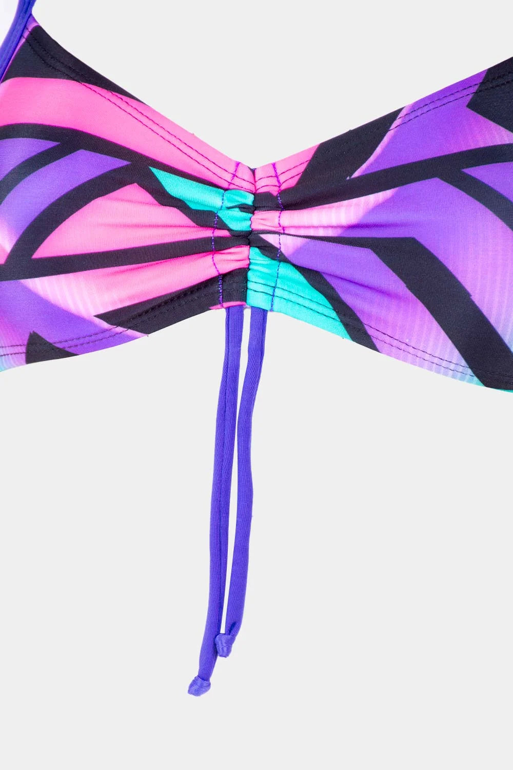 Women's sport bikini top in purple and teal geometric, close-up view – Bikini Uni