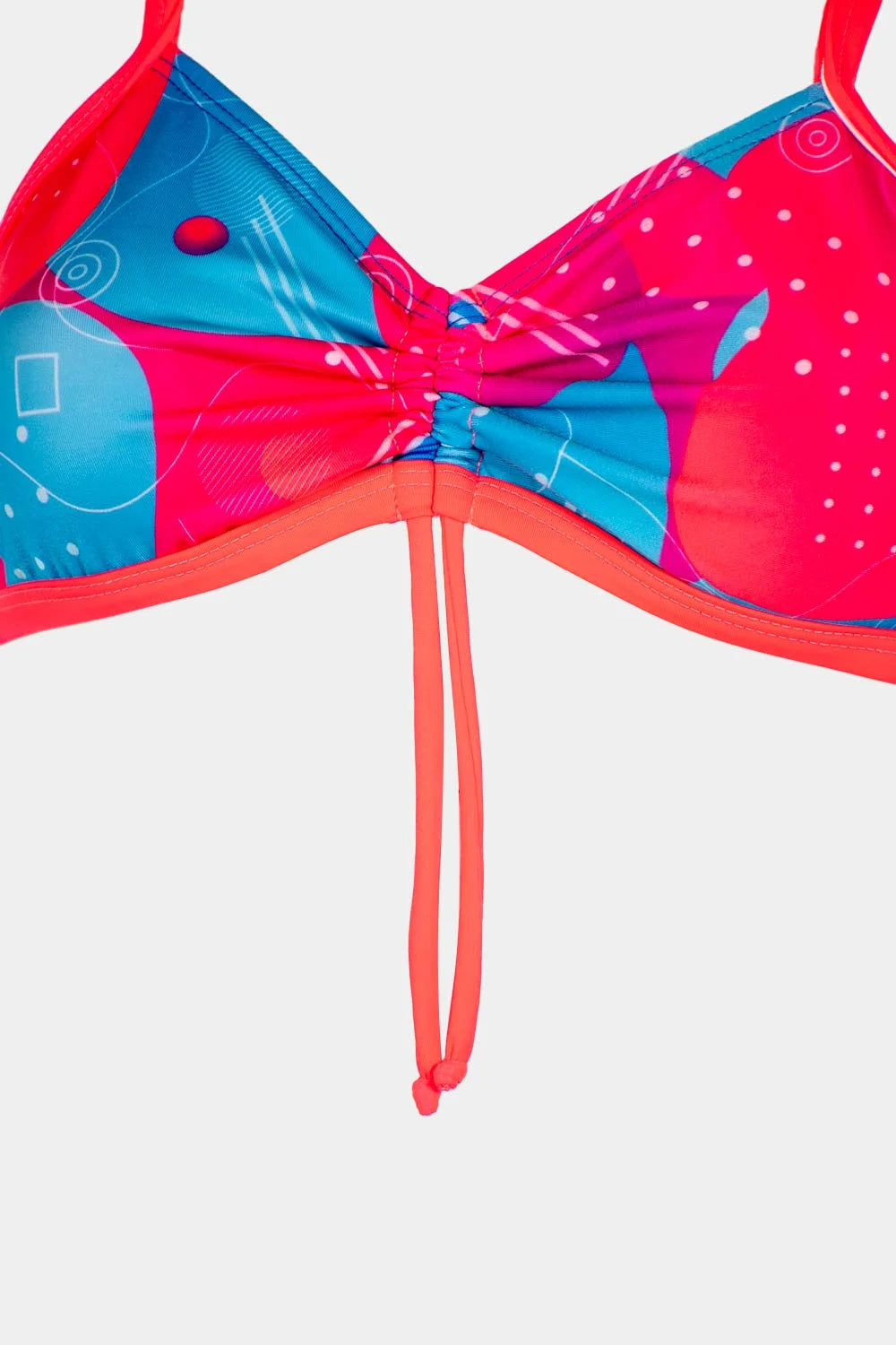 Women's strappy bikini top in pink and blue print, close-up view – Bikini Uni